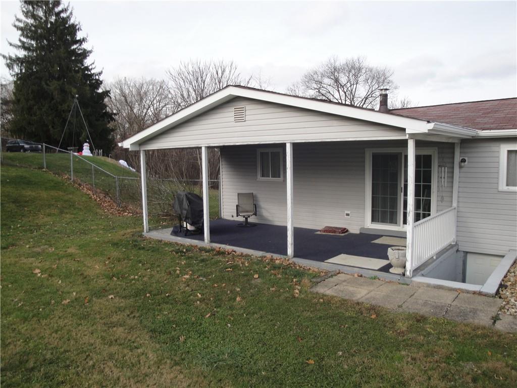 122 Cooper Road Finleyville, PA 15332 - Photo 4 of 25 Covered rear patio...