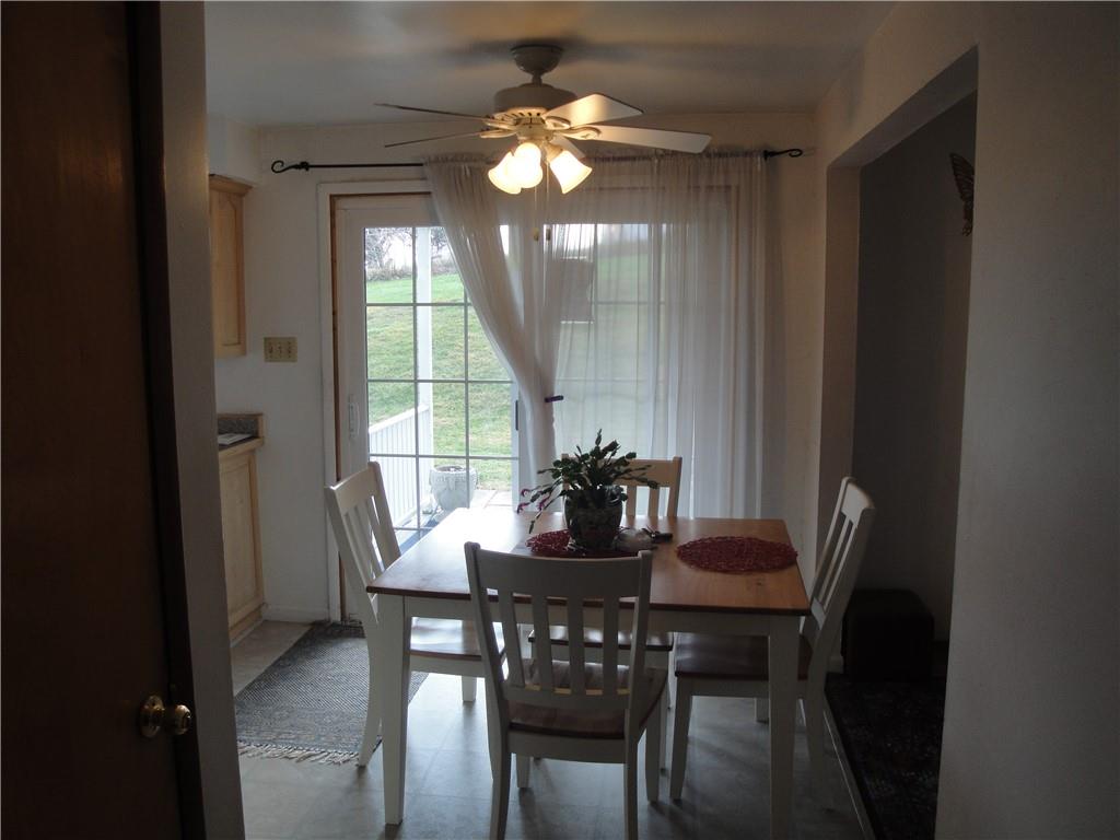 122 Cooper Road Finleyville, PA 15332 - Photo 8 of 25 Kitchen dinning area w/ sliding glass door that leads out to covered patio...