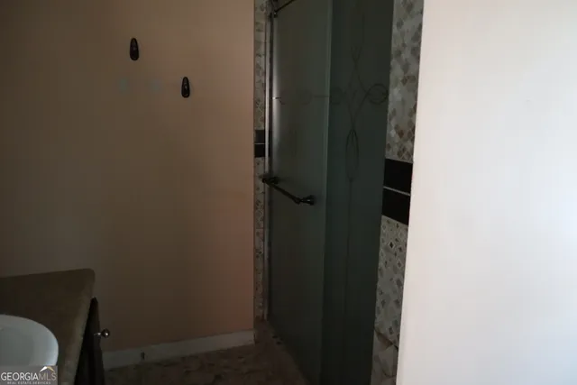 a bathroom with a toilet and a sink