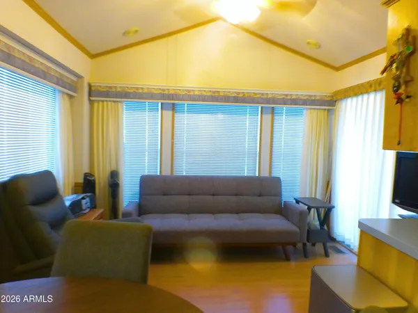 a bedroom with a bed and a cabinets