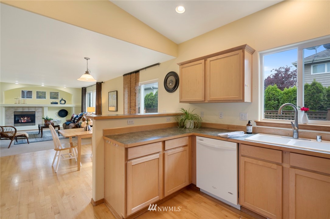 3530 186th Place Southeast Bothell, WA 98012 - Photo 11 of 38 a kitchen with a sink cabinets and window