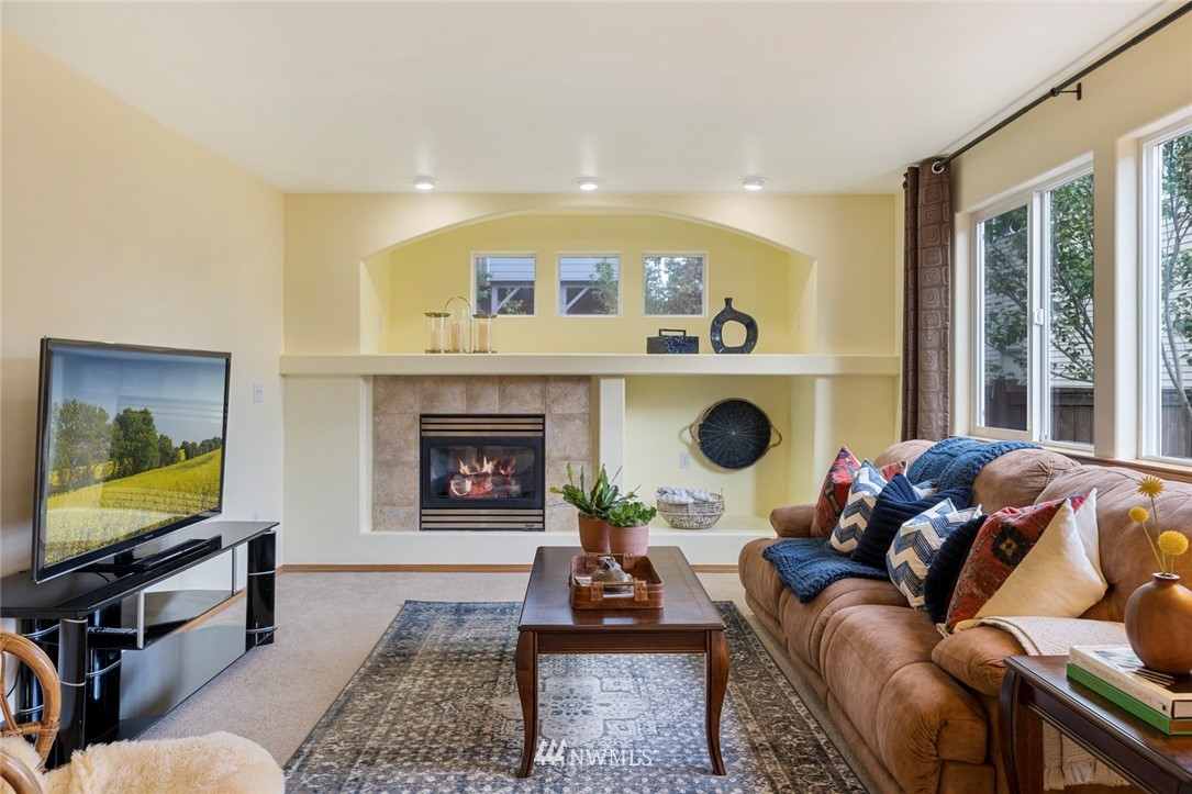 3530 186th Place Southeast Bothell, WA 98012 - Photo 3 of 38 a living room with furniture and a flat screen tv