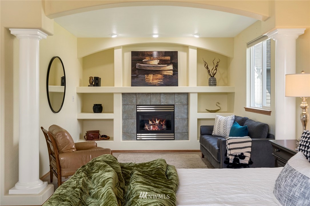 3530 186th Place Southeast Bothell, WA 98012 - Photo 21 of 38 a living room with furniture and a fireplace