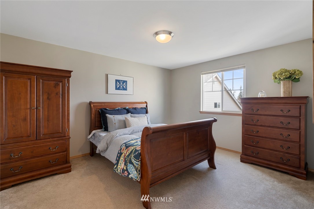 3530 186th Place Southeast Bothell, WA 98012 - Photo 28 of 38 a bedroom with a bed and a dresser