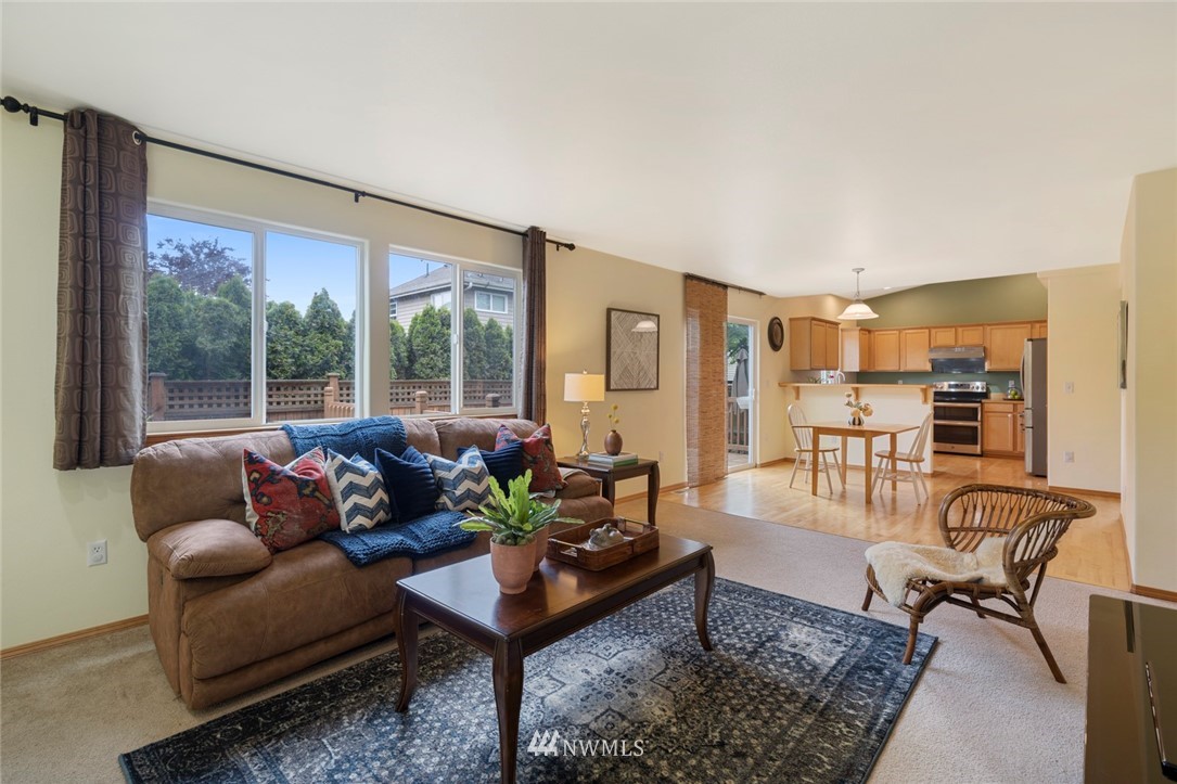 3530 186th Place Southeast Bothell, WA 98012 - Photo 5 of 38 a living room with furniture and a large window