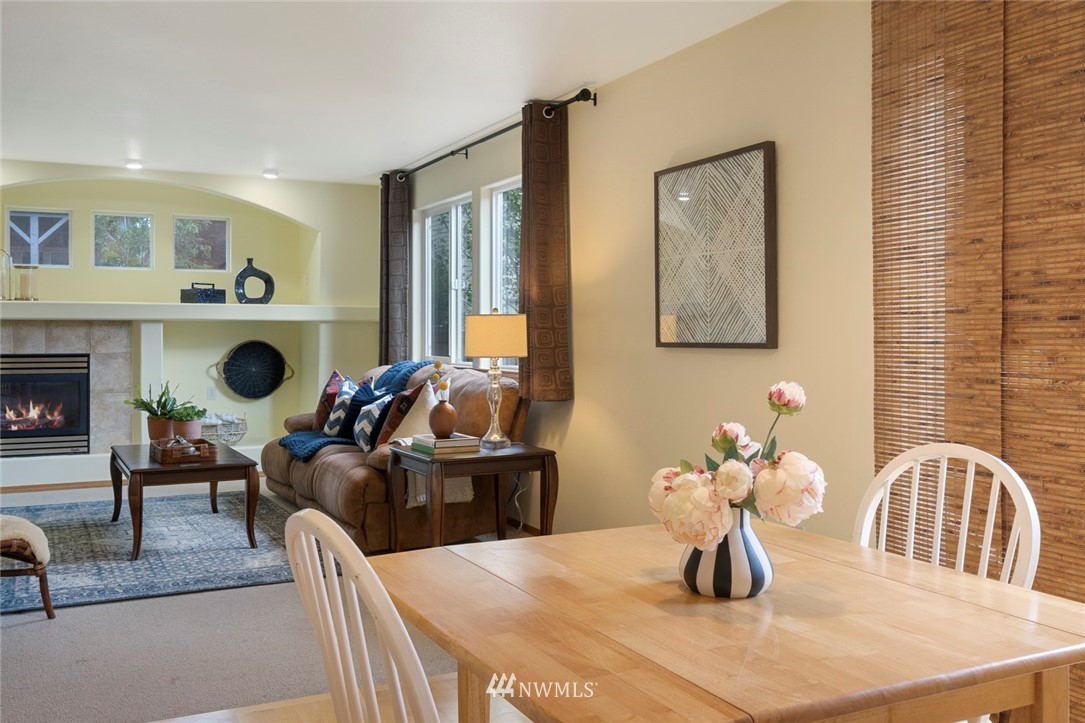 3530 186th Place Southeast Bothell, WA 98012 - Photo 6 of 38 a living room with furniture and a fireplace