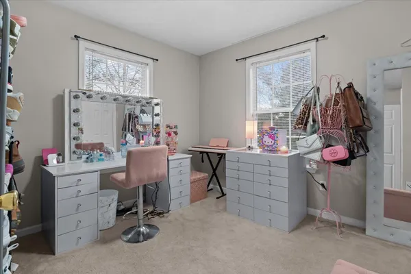 a view of a workspace with furniture