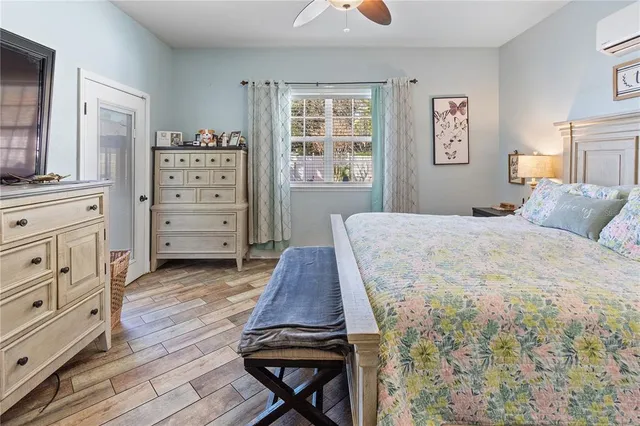 a bathroom with a double vanity sink mirror and bathtub