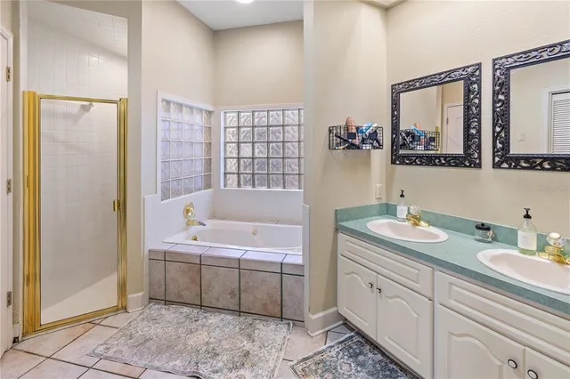 a bathroom with sink and mirror
