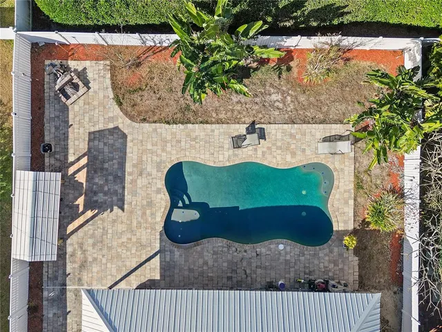a kitchen with stainless steel appliances granite countertop a stove oven and a refrigerator