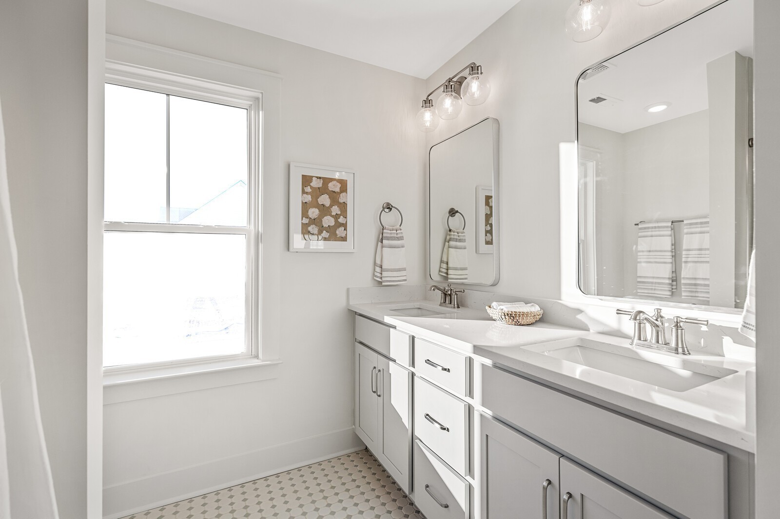 907 Heatherfield Ln Spring Hill Spring Hill, TN 37174 - Photo 14 of 19 a bathroom with a double vanity sink window and a mirror