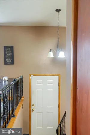 a view of a hallway with closet