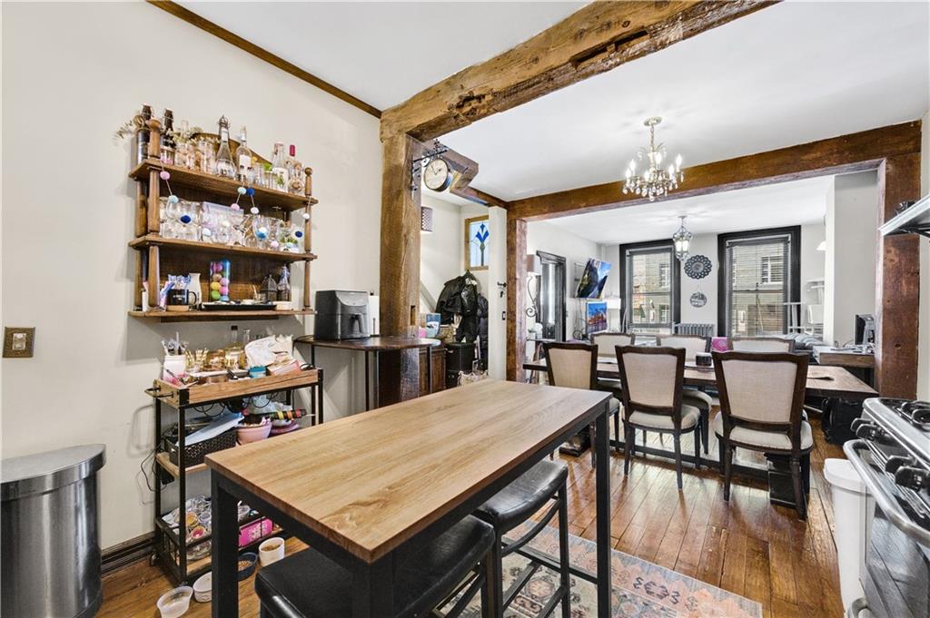 1030 Greene Avenue Brooklyn, NY 11221 - Photo 8 of 19 a view of a dining room with furniture