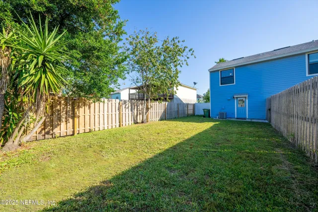 a view of a backyard with a garden