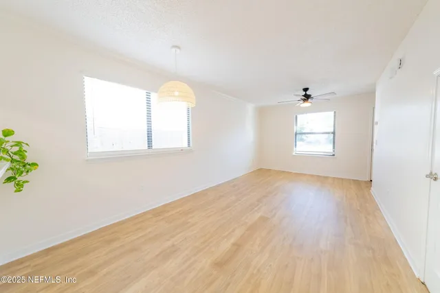 an empty room with windows