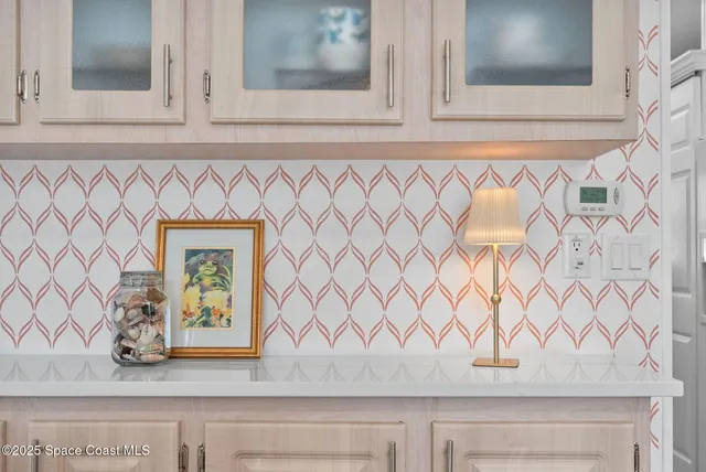 a kitchen with a sink dishwasher a stove and a refrigerator with wooden floor