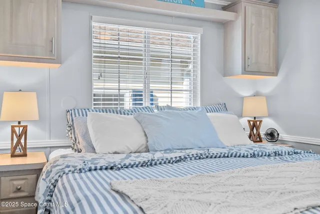 a view of a bathroom with washer and dryer
