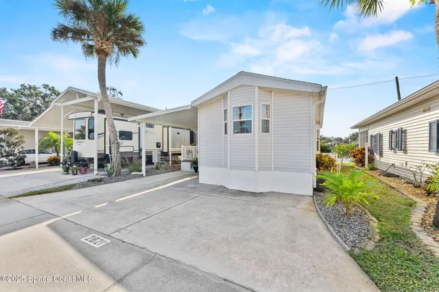 a view of a lake with a yard