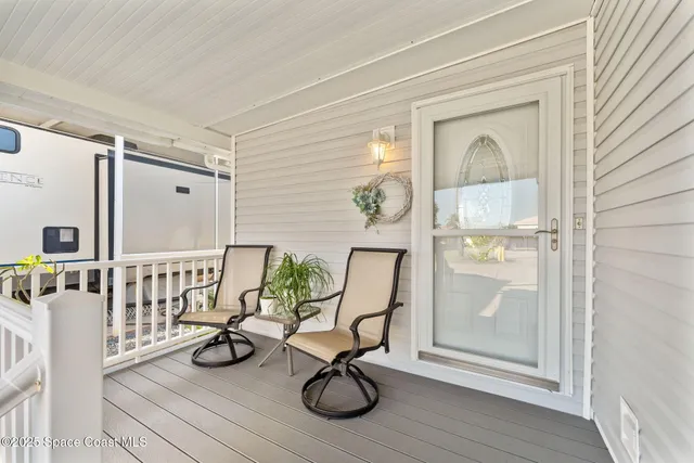 a kitchen with granite countertop a sink stove and refrigerator
