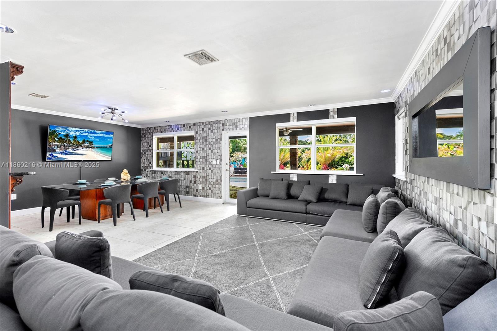 250 Northeast 158th Street Miami, FL 33162 - Photo 18 of 80 a living room with furniture and a large window