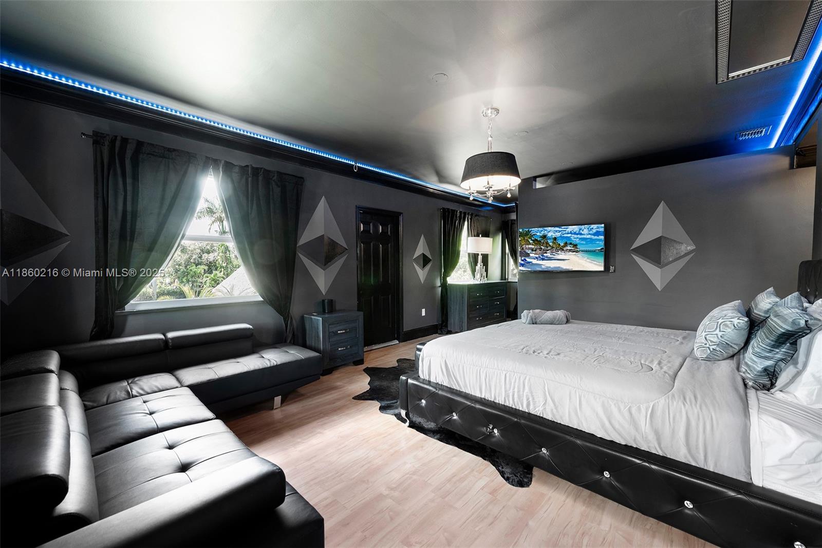 250 Northeast 158th Street Miami, FL 33162 - Photo 25 of 80 a bedroom with bed and a window