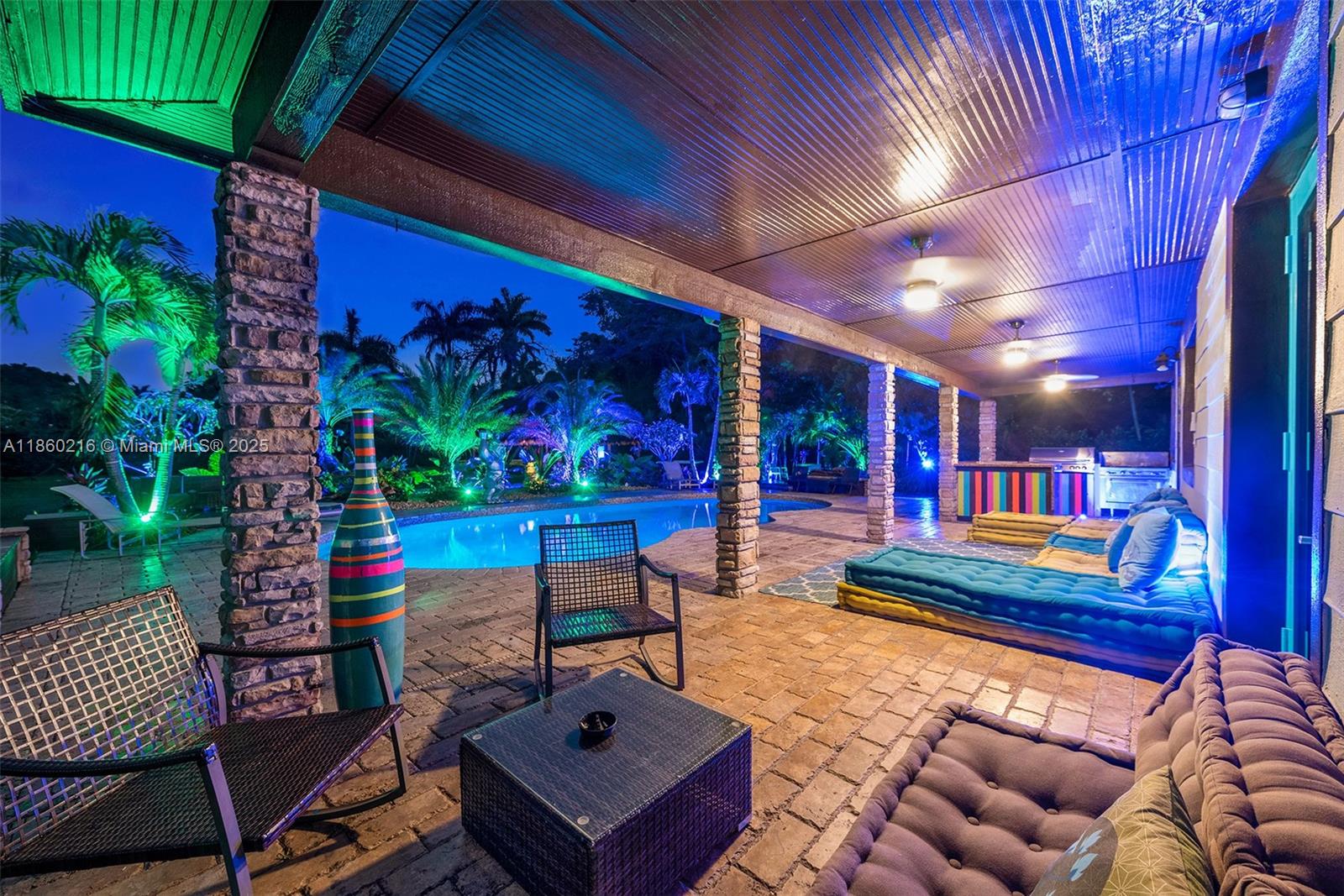 250 Northeast 158th Street Miami, FL 33162 - Photo 3 of 80 a outdoor living space with patio furniture