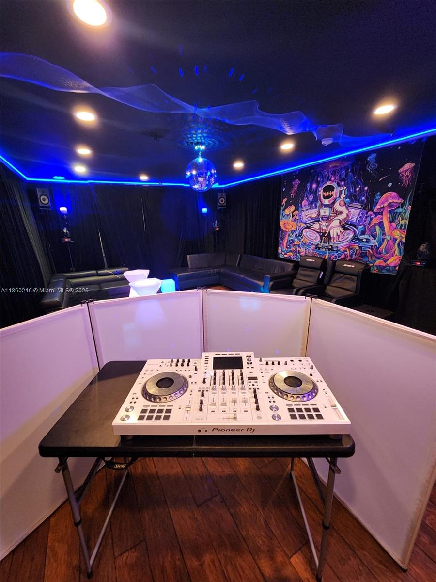 250 Northeast 158th Street Miami, FL 33162 - Photo 10 of 80 a view of a table and chairs in a room