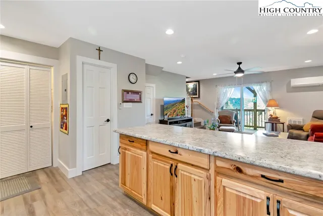 a kitchen with sink and cabinets