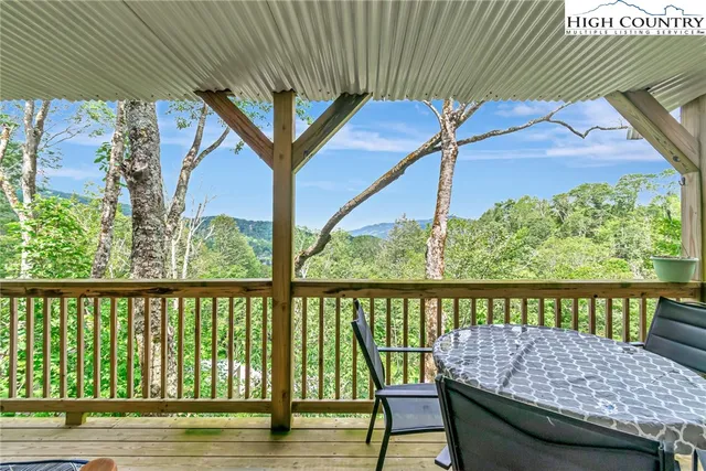 a view of a two chairs in the deck