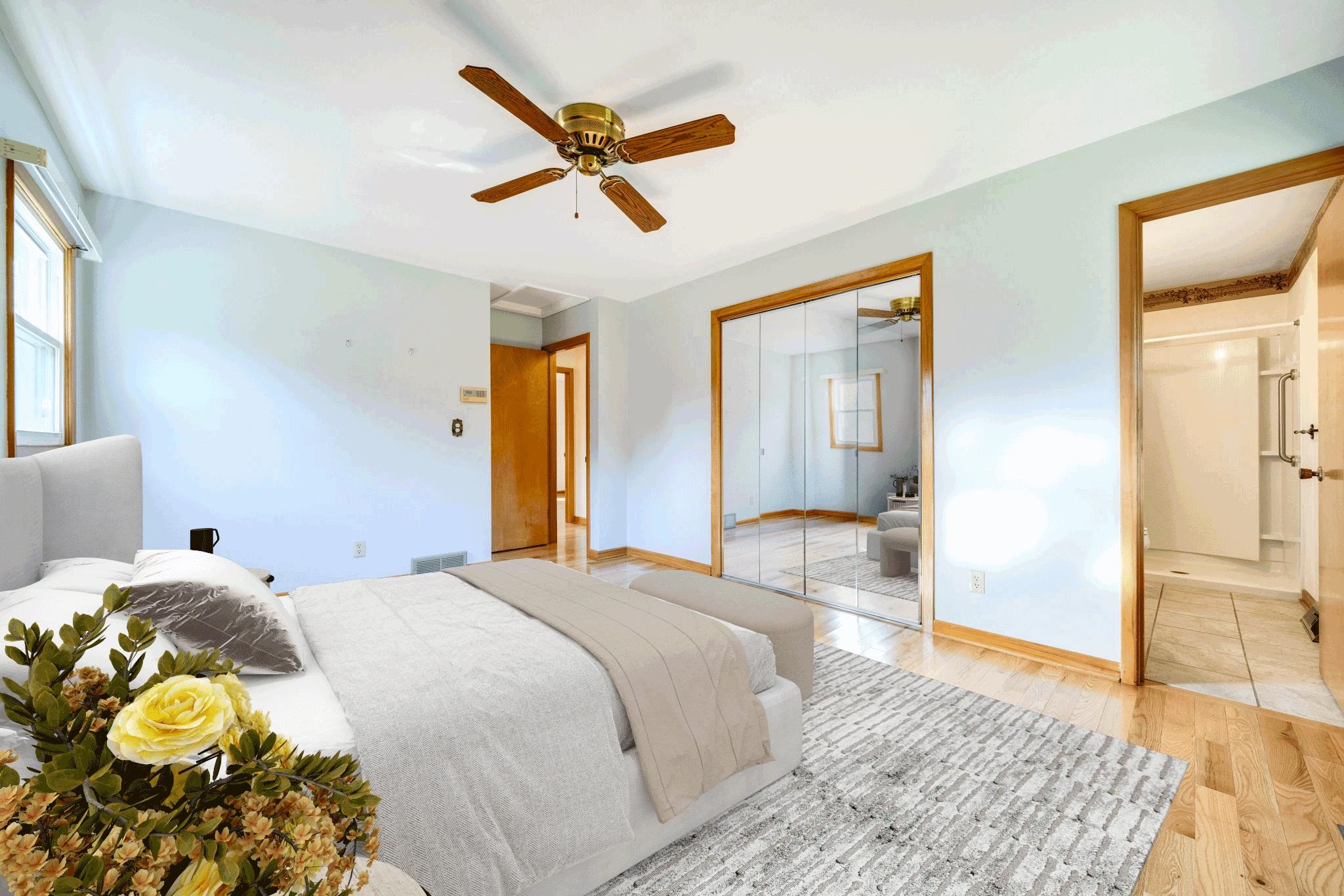 1198 Riverside Road Belvidere, IL 61008 - Photo 11 of 35 a bedroom with a bed and a large mirror with a dresser