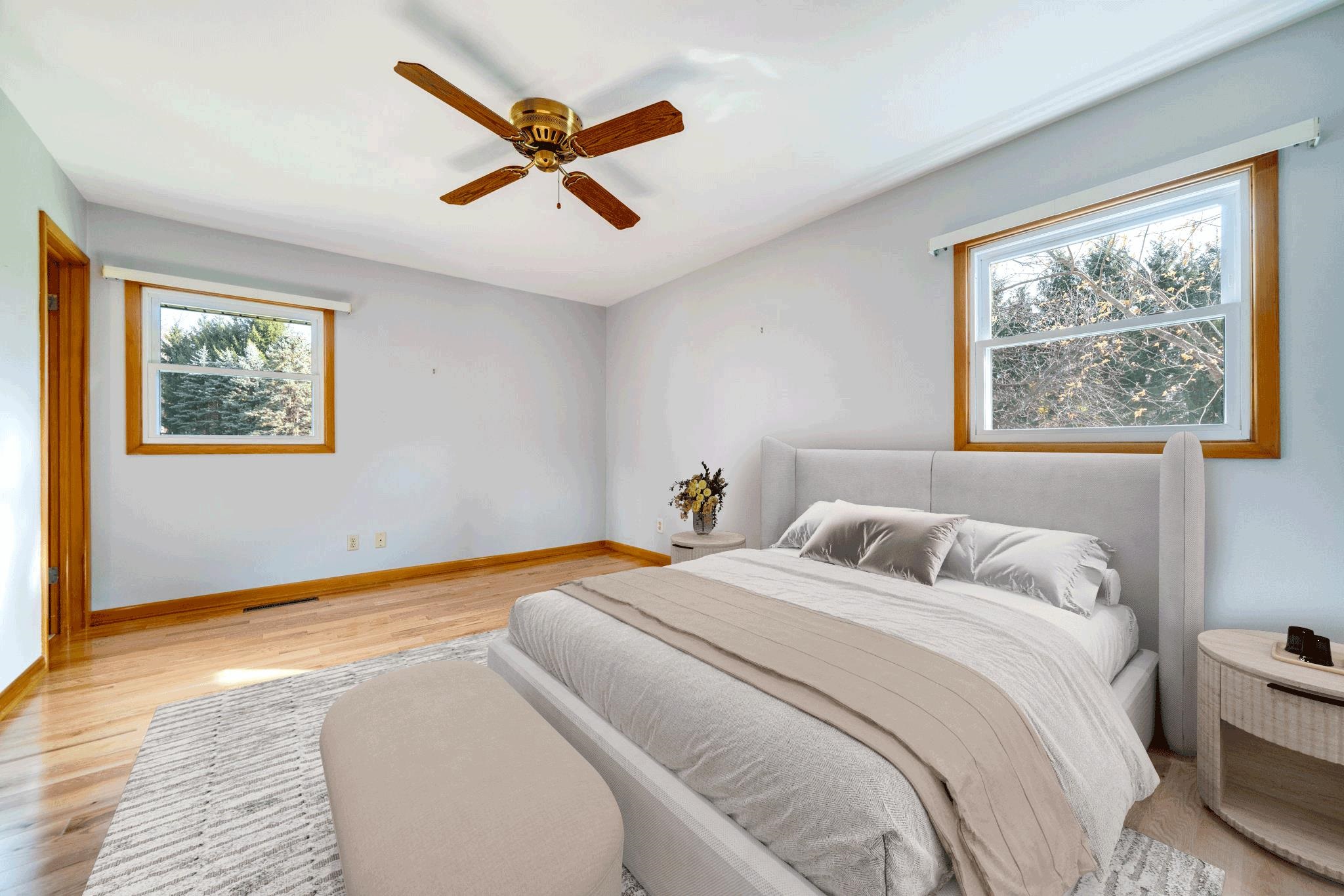 1198 Riverside Road Belvidere, IL 61008 - Photo 16 of 35 a bedroom with a bed and a large window