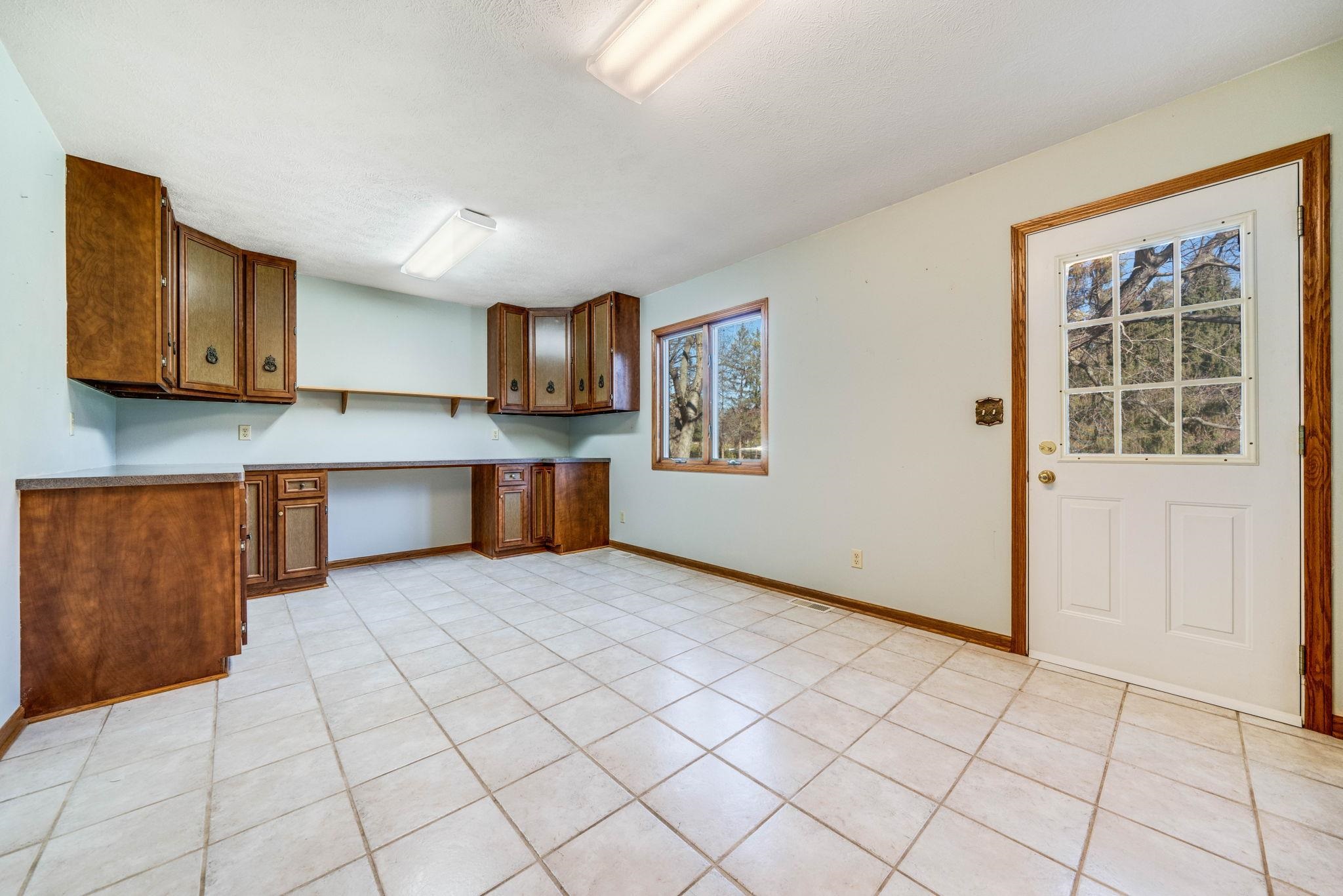 1198 Riverside Road Belvidere, IL 61008 - Photo 18 of 35 a view of kitchen with microwave oven cabinets and a sink