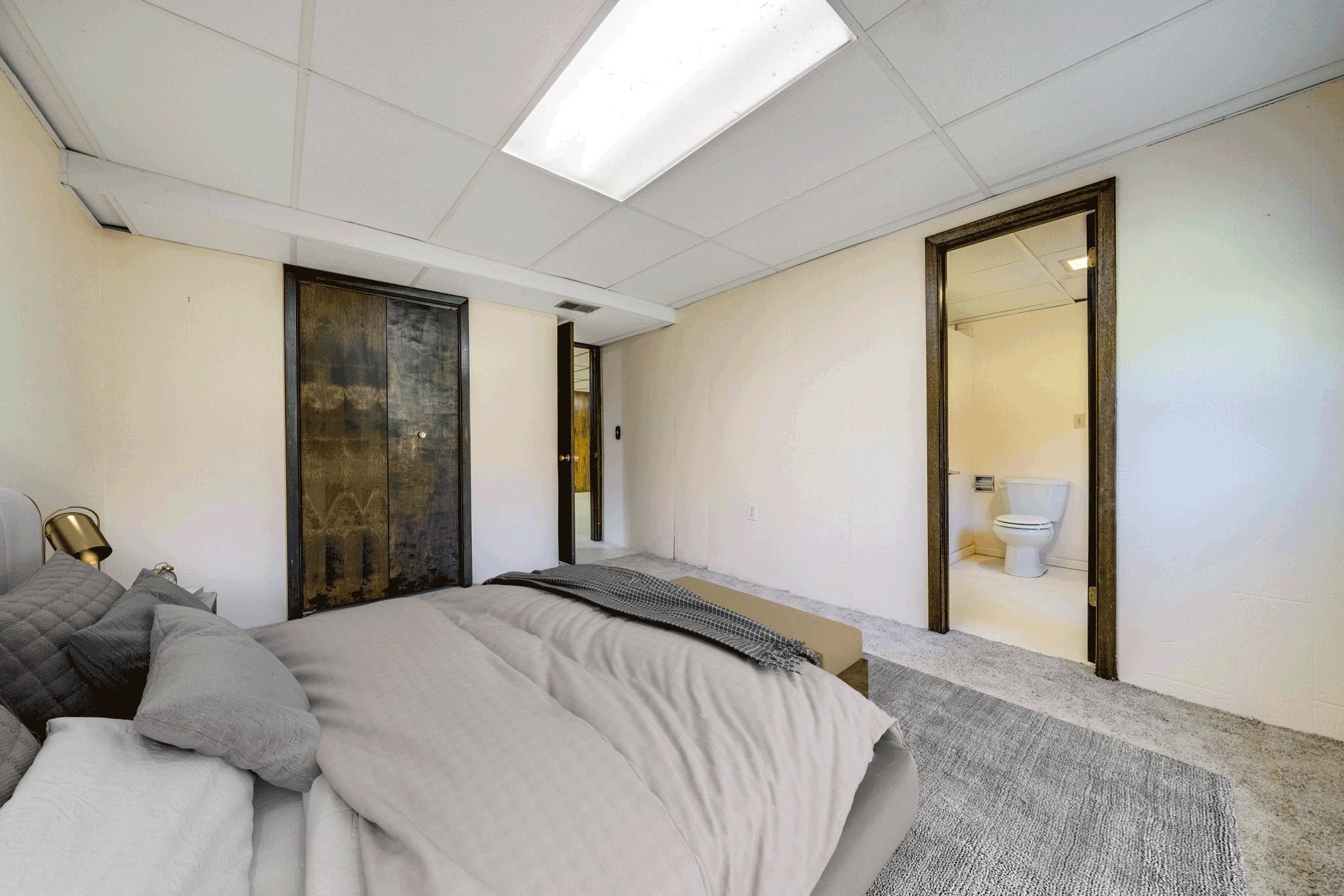 1198 Riverside Road Belvidere, IL 61008 - Photo 23 of 35 a bedroom with a bed and a window