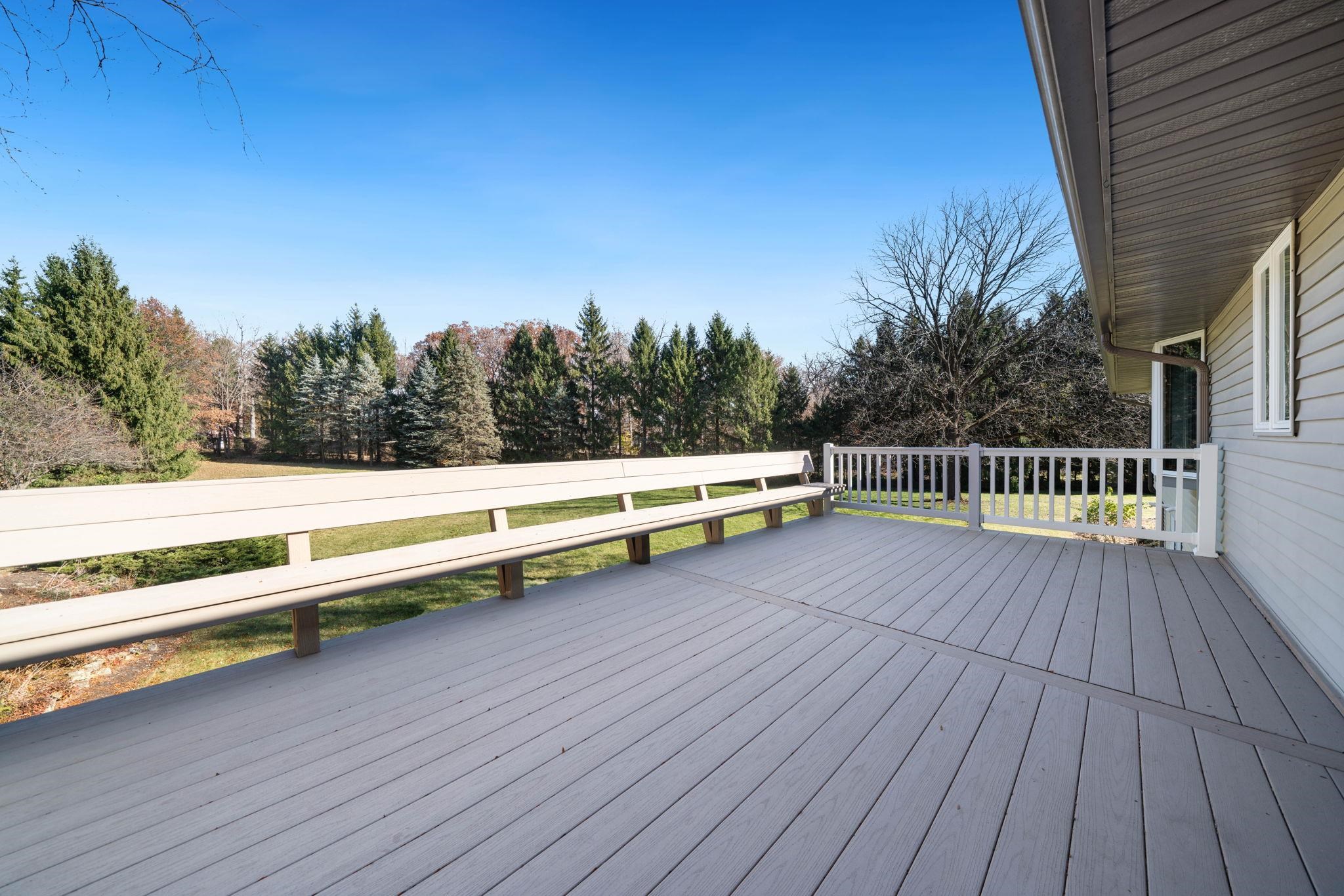1198 Riverside Road Belvidere, IL 61008 - Photo 30 of 35 a view of a balcony with wooden floor and fence