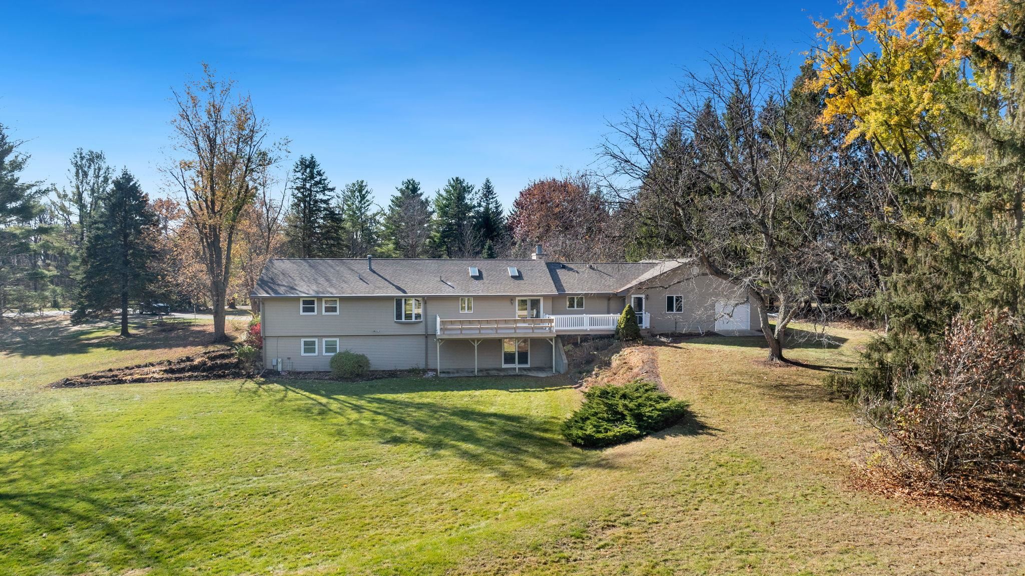 1198 Riverside Road Belvidere, IL 61008 - Photo 3 of 35 a view of a house with a yard and tree s