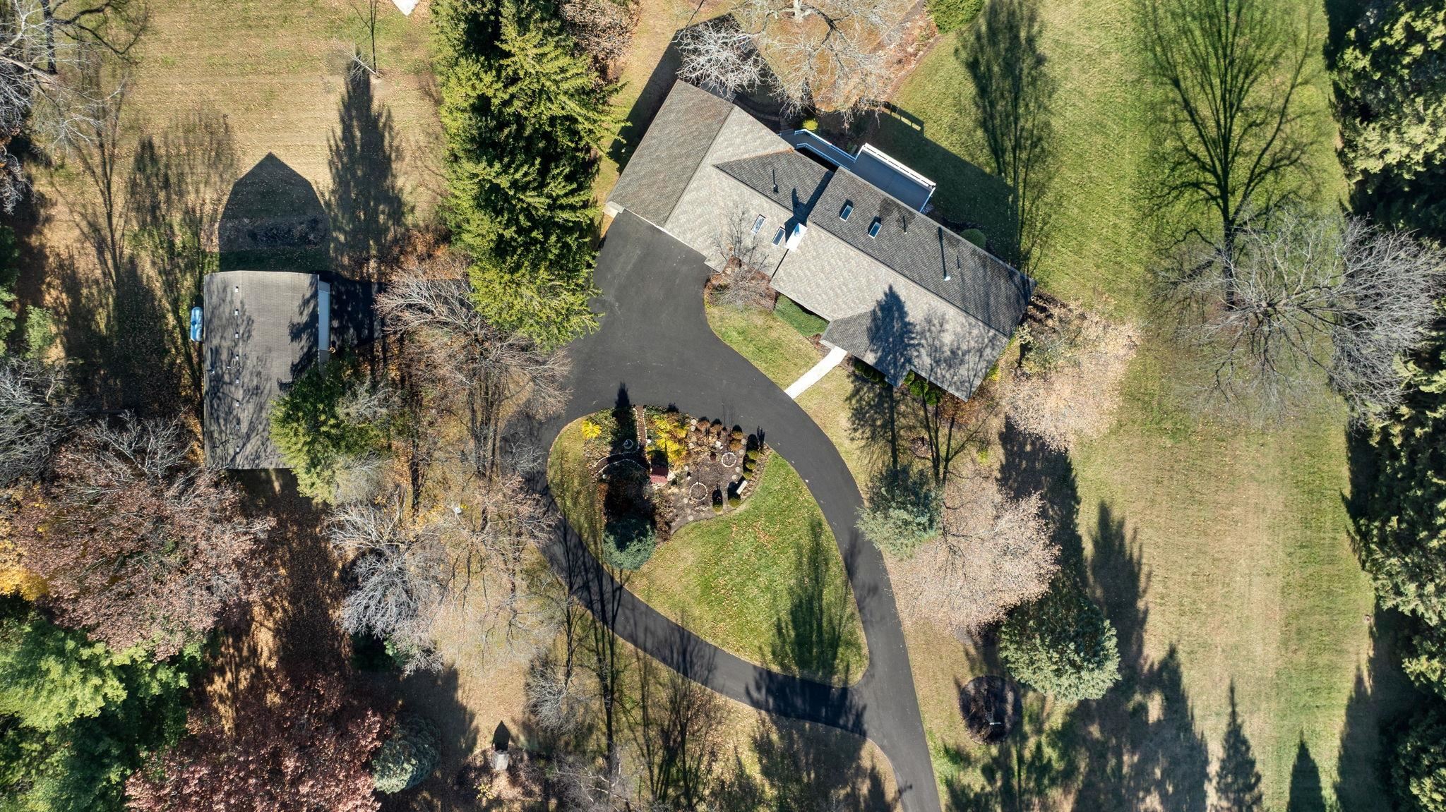 1198 Riverside Road Belvidere, IL 61008 - Photo 33 of 35 an aerial view of a house with a yard