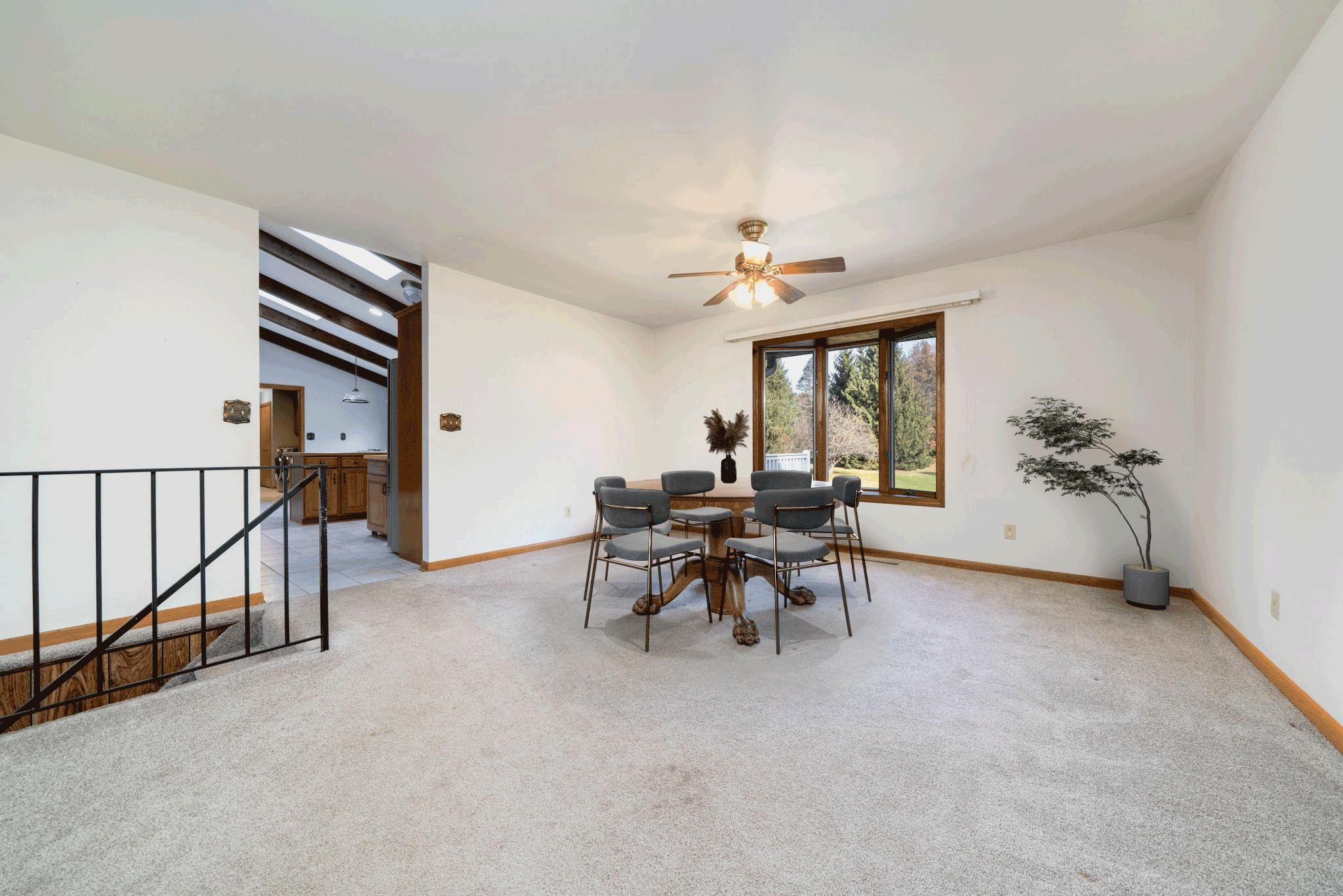 1198 Riverside Road Belvidere, IL 61008 - Photo 5 of 35 a view of a livingroom with furniture and a window