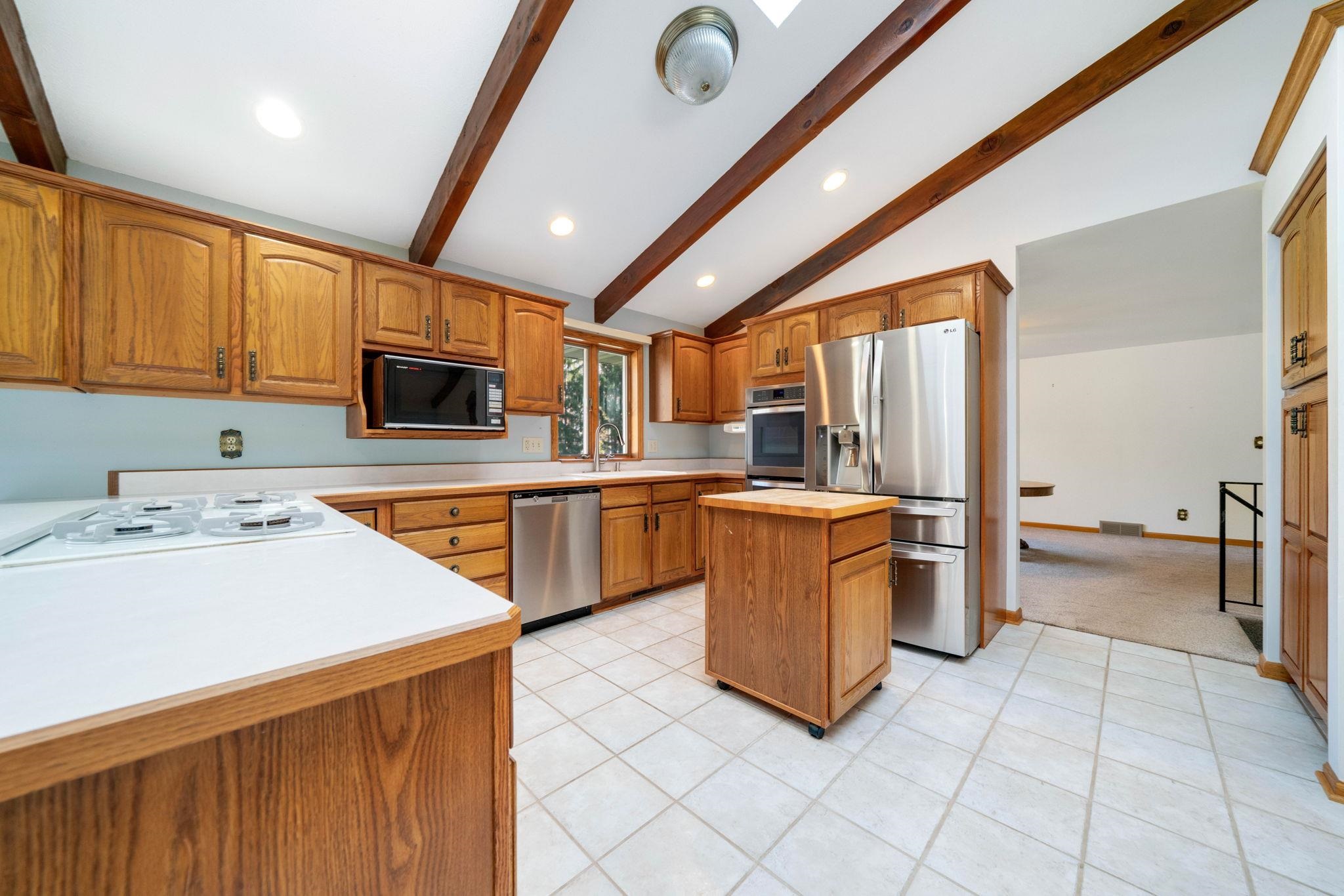 1198 Riverside Road Belvidere, IL 61008 - Photo 8 of 35 a kitchen with a sink appliances and cabinets