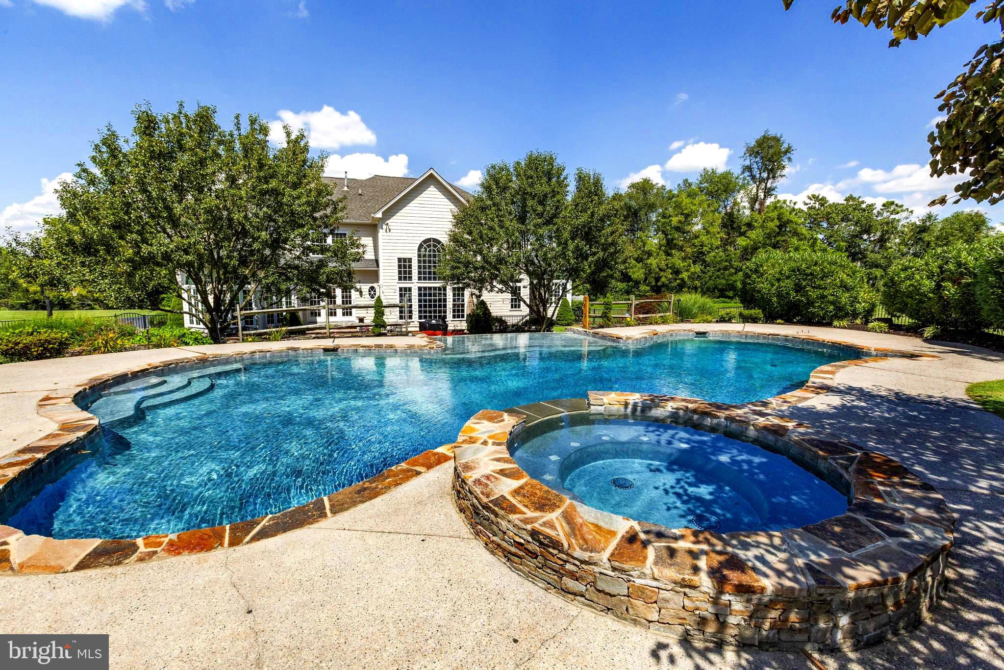 124 Anderson Farm Road Phoenixville, PA 19460 - Photo 3 of 40 Resort-like back yard with pool and spa
