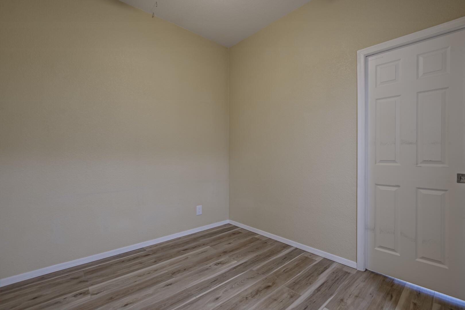 16 North Star Vale Road, Unit 122B Star Valley, AZ 85541 - Photo 16 of 21 a view of an empty room with wooden floor