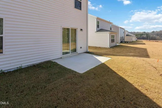 a view of a backyard of a house
