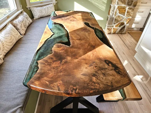 a bathroom with double vanity and a mirror