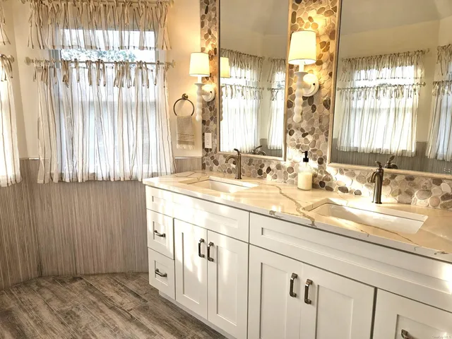 a living room with a bed and furniture