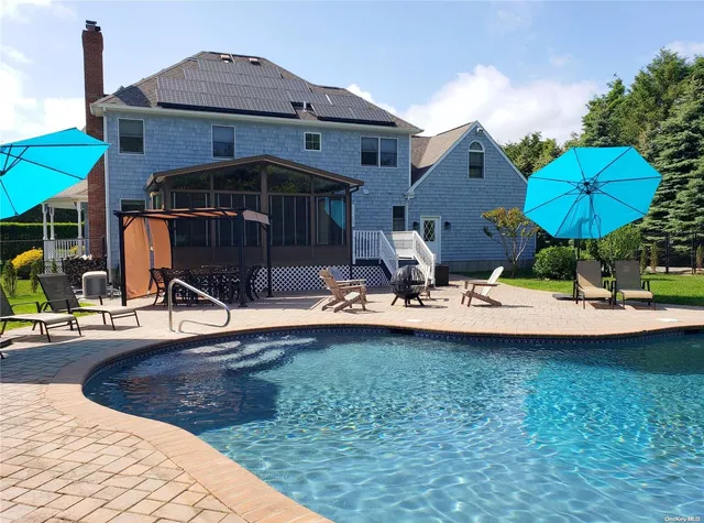 a view of a lake in between two of people