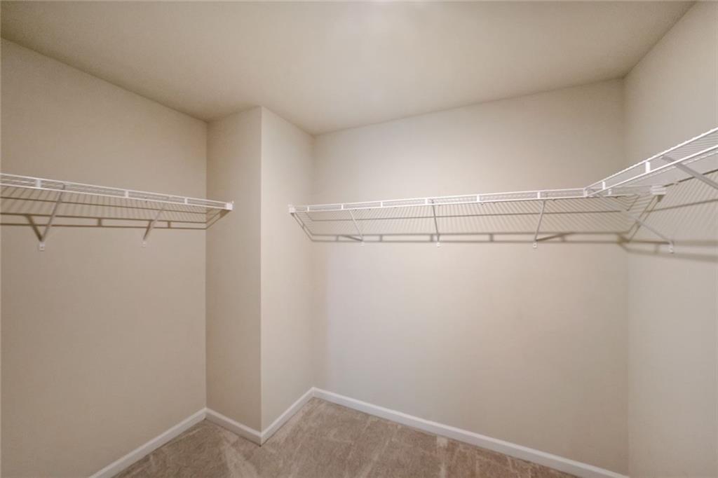 4450 Richmond Court Stone Mountain, GA 30083 - Photo 20 of 31 a view of a room with racks on the wall
