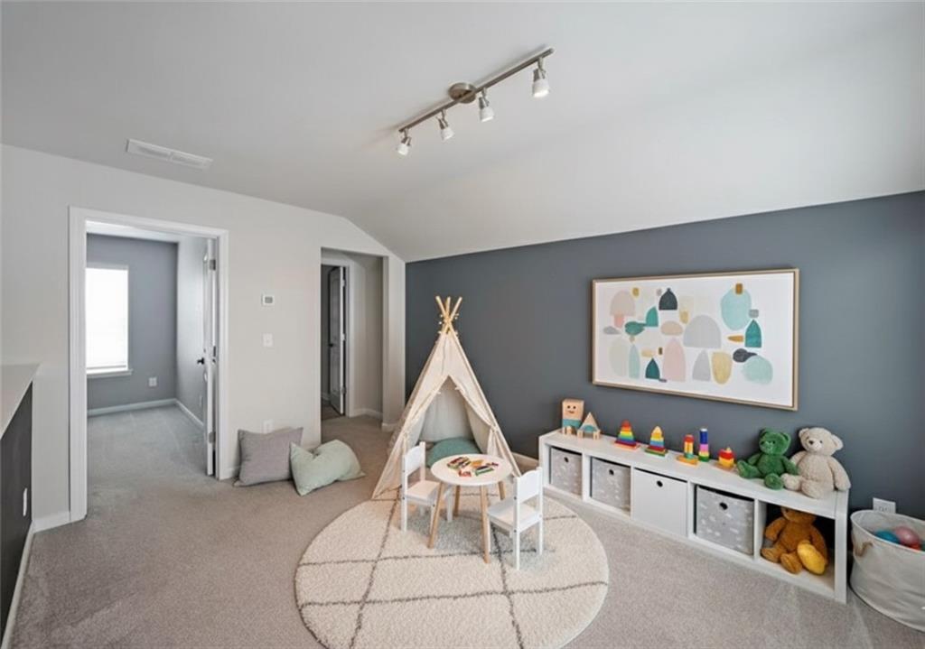 4450 Richmond Court Stone Mountain, GA 30083 - Photo 24 of 31 a room with furniture and white walls
