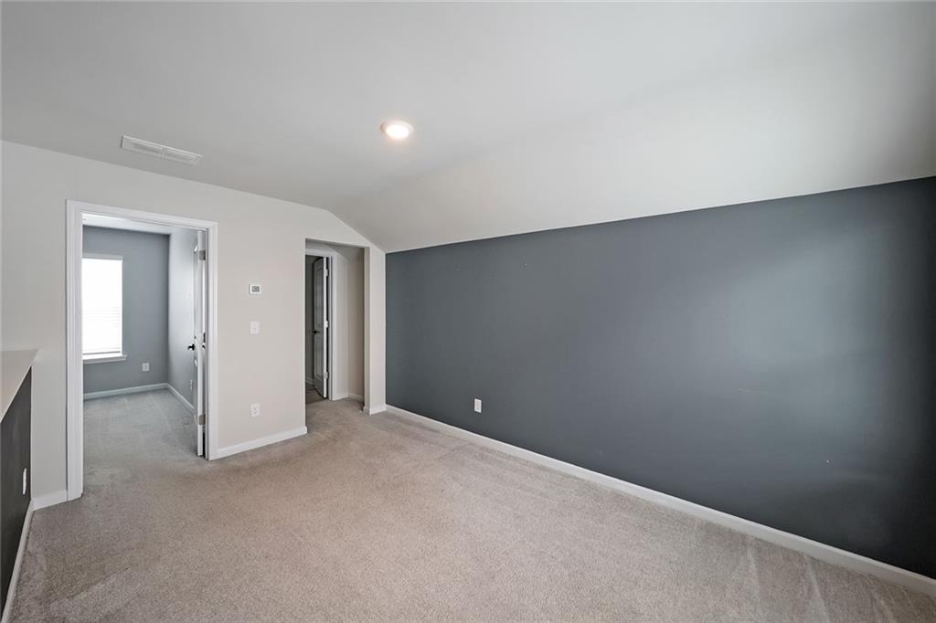 4450 Richmond Court Stone Mountain, GA 30083 - Photo 25 of 31 a view of an empty room