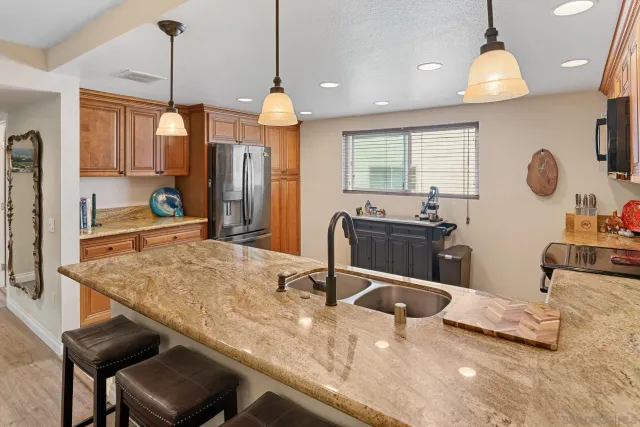 a kitchen with sink and window