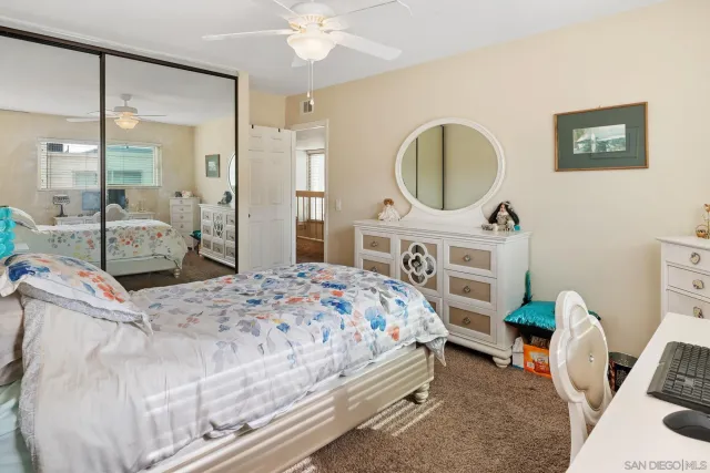 a view of a bedroom from the hallway