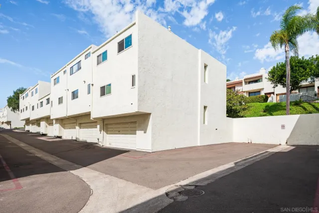 a view of house with outdoor space and seating area